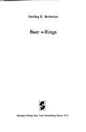 Baer *-Rings