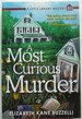 A Most Curious Murder: a Little Library Mystery