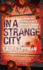 In a Strange City (a Tess Monaghan Investigation)