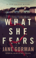 What She Fears: Book 4 in the Adam Kaminski Mystery Series